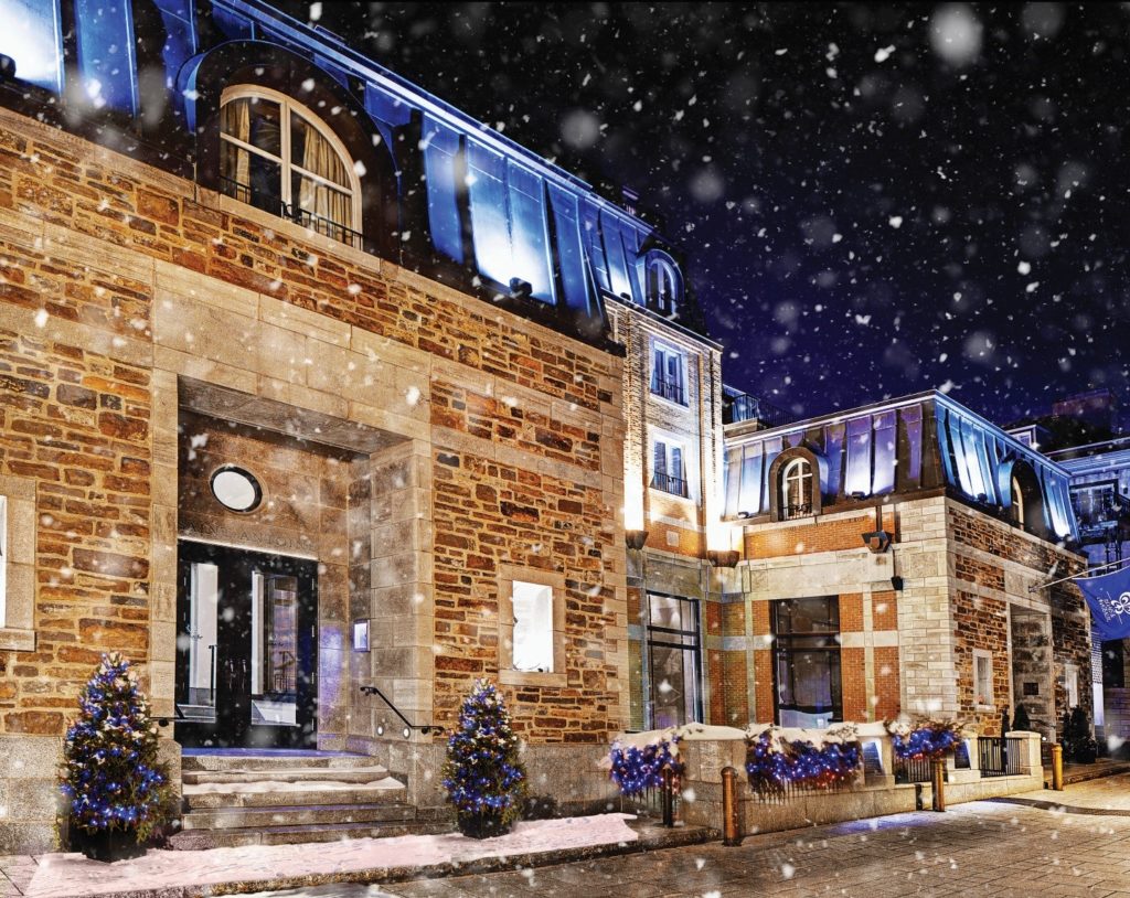 Snow falling outside Auberge Saint Antoine in Quebec City