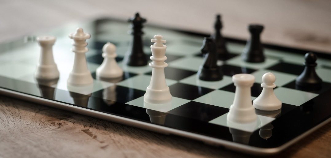 Chess pieces on a tablet